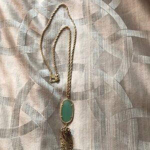 Kendra Scott long necklace with aquamarine stone.